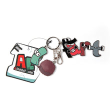 Load image into Gallery viewer, ALPHABET LORE – "FART" Keychain | 2.75" Wide Metallic Keychain | Featuring Iconic Characters A, F, R, T & L | Durable, Fun & Collectible Accessory for Fans | Great Gift | Hilarious & Stylish | Officially Licensed